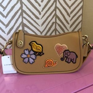 Brand new coach swinger